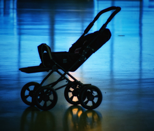 An empty baby stroller