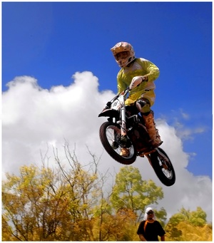 Motocross jump up during event