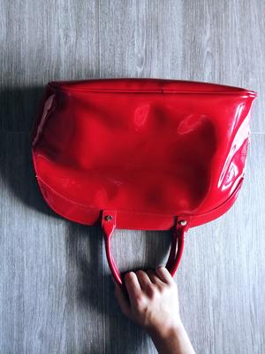 Red handbag on the table