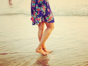 Woman on beach in summer