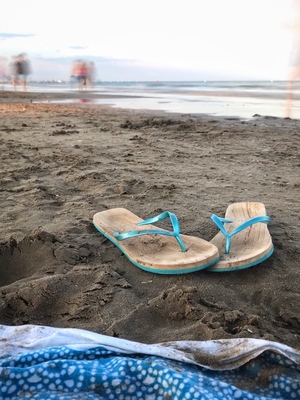 flip flops on the sand