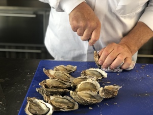 preparing oysters for dinner