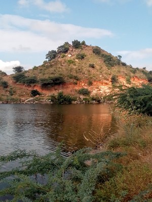 A small hill beside a lake