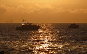 boats in sunrise