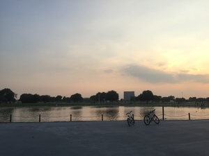 Sunset with bicycles on the lake shore
