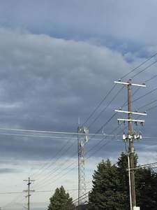 power lines in front of sky