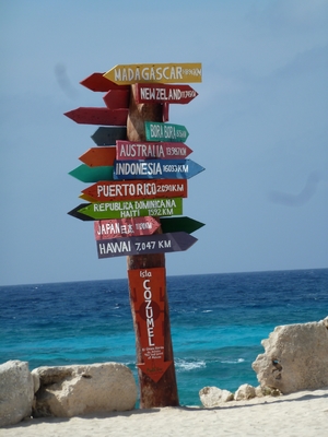 Sign post on an island