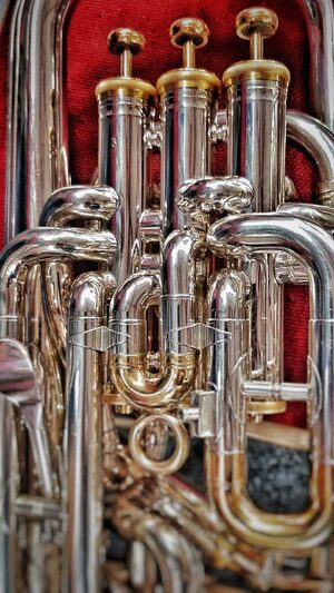 shiny pipe work on a musical brass instrument
