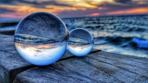 Sunset reflected in two spheres