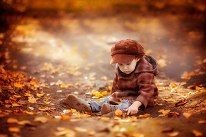 Baby boy in autumn park