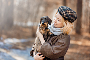Young attractive woman with dog