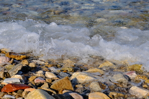 Sea wave pebble shore
