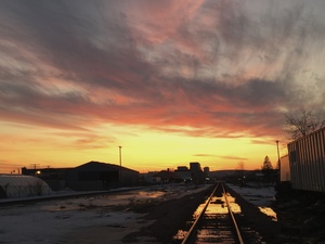 Sunset reflecting off train tracks