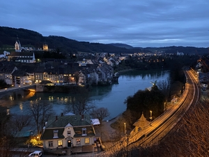 Nighttime view on village and bridge on the Rhine