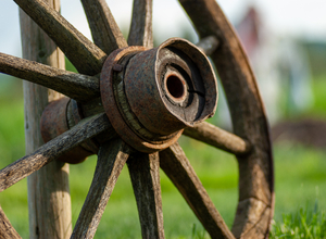 an old, beautiful carriage wheel