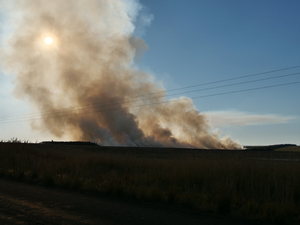 veld fire started and controlled by farmers