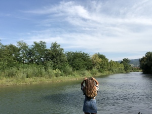 Girl looking at river