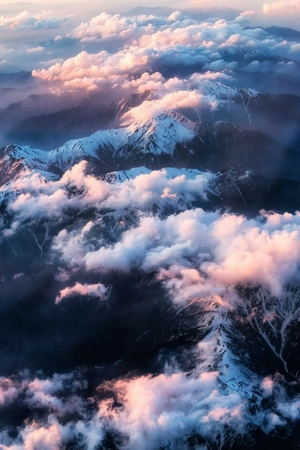 Aerial view above clouds of Romania