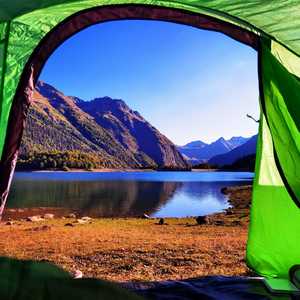 View of lake and mountains from tent