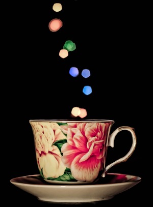 bokeh light in cup of coffee