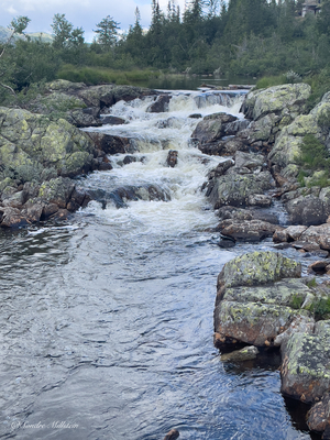Stream between rocks in Norway