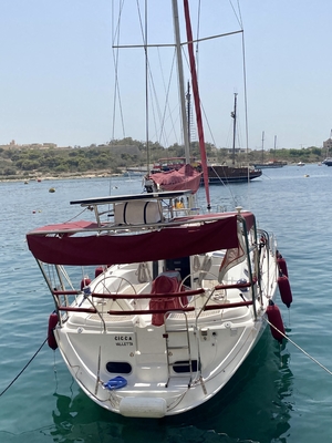 Sailboat moored in a bay in the Mediterranean Sea