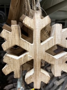 Wooden snowflake for Christmas tree decoration