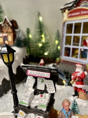 Miniature Christmas village with figurines