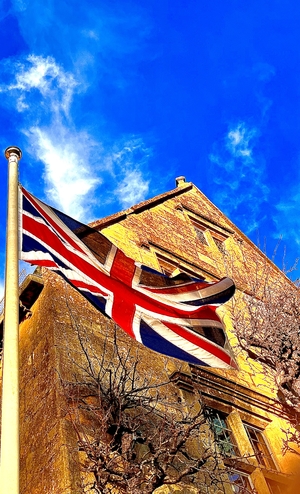 British flag in front of house
