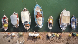 Row of fishing boats in Lesbos Greece