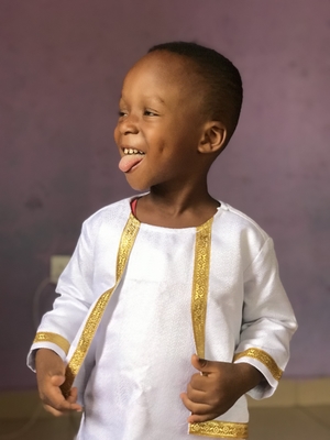 Smiling young boy with traditional clothes