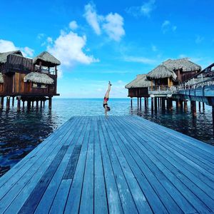 Handstand on pier Bora Bora