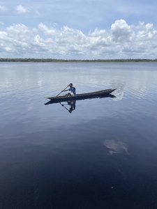 Man rowing on lake