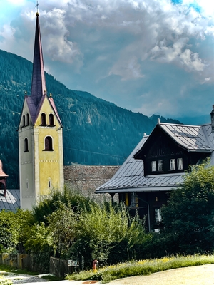 Traditional church and house in mountains