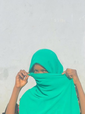 Women dressed Islamic wearing green Hijab