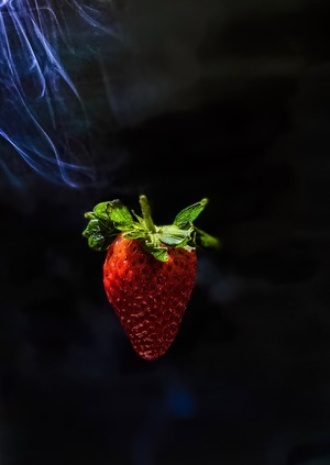 Floating Strawberry on black background