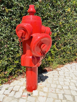 Red fire hydrant on a residential street