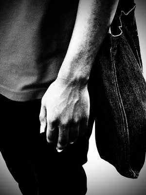 Close up of arm with bag B&W