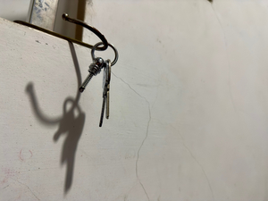 House keys hanging on wall
