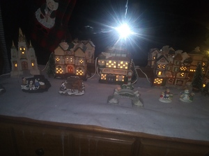 Christmas village decorations look pretty all lit up!