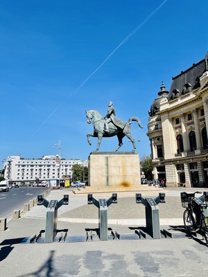 statue in University Square in Bucharest