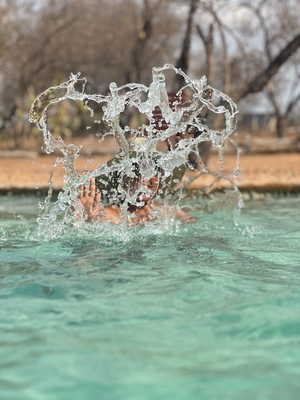 Splash of water in swimming pool